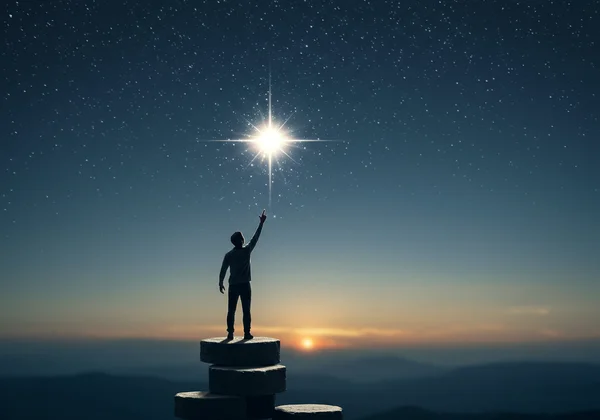 A person reaching for a star, symbolizing setting inspiring goals
